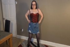 Striptease in denim skirt Basque stockings and hee